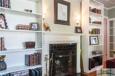 We just love these bookshelves around the fireplac
