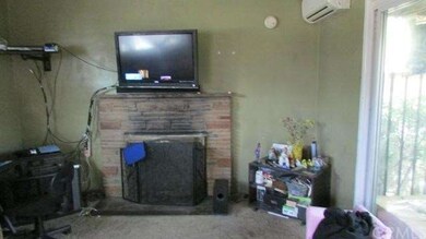 Liv room with fireplace on 105th
