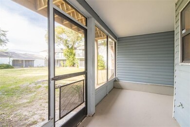 Large screened in porch with large backyard!