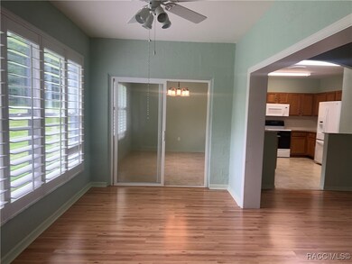 Cozy Classy Den-Sunroom w/ Laminate Flooring and G
