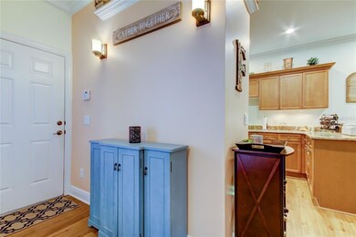 Sellers added a wall to seperate kitchen from entr