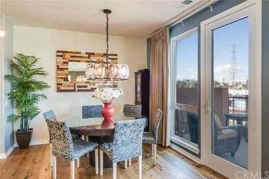 Dining room opens to kitchen and to balcony