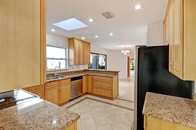 6887 Palm Grove Kitchen to LR
