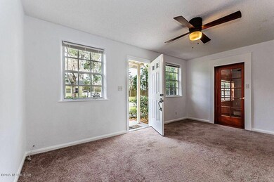Living room with new carpet and freshly
