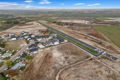 Aerial overview of property's location with nearby suburban area