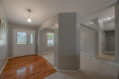 View of front entry and formal dining room space
