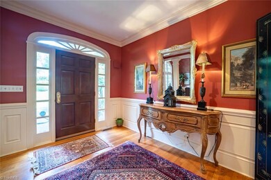 Lovely foyer with wainscoting