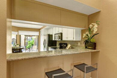 KITCHEN THROUGH BREAKFAST BAR MLS