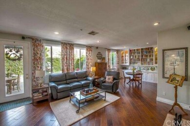 Extended family room with diagonal hardwood floor 