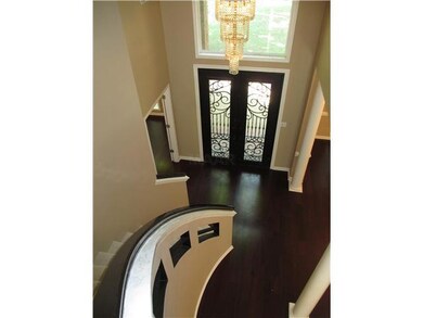 Spiral staircase & custom made front door.
