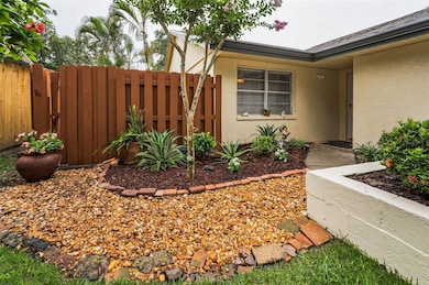 Beautifully landscaped greenspace and private entry