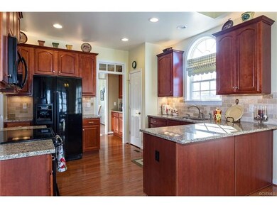 Kitchen features NEW GRANITE COUNTERS, tile backsp