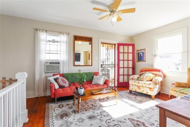 UPSTAIRS: Wonderful sitting space for hosting frie