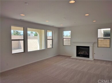 Spacious Great Room with fireplace, additional rec