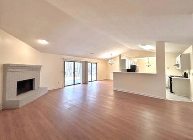 Unfurnished living room featuring light wood finis