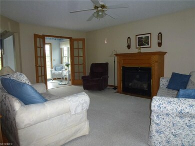 Living Room with Fireplace viewed from 2 story foy
