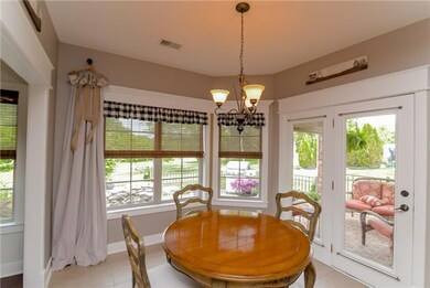 Large breakfast nook overlooks backyard