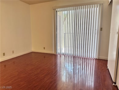Unfurnished room with wood finished floors