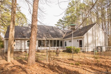 Rear View with Partially Fenced Yard.