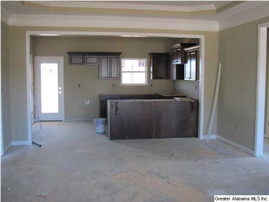 Open floor plan looking from living room into kitc