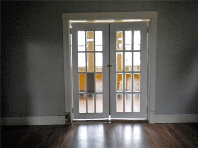 french doors to enclosed porch