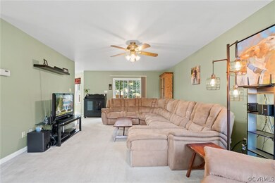 Sliding glass door leads to rear deck.