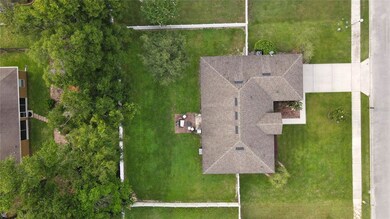 House backs up to a walking trail with gate access