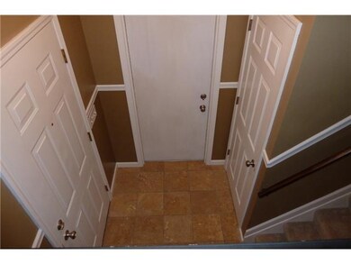 Foyer Updated foyer with New travertine tile floor