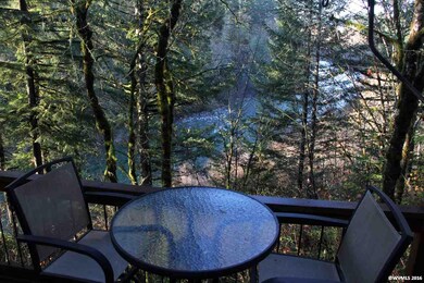 Enjoy the view and river sounds from the deck just