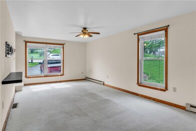 Bright and inviting! This spacious living room is