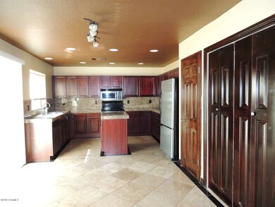 View from Family Room into Kitchen