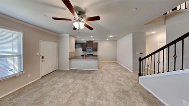 Unfurnished living room with light tile patterned flooring, a wealth of natural light, and ceiling fan
