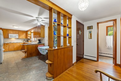 Lovely entrance to home with a generous closet and 1/2 bath