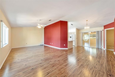 View from entry door into the living room & dining room.