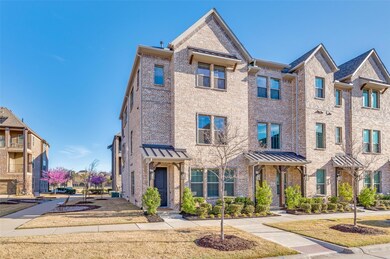 Townhome / multi-family property with brick siding