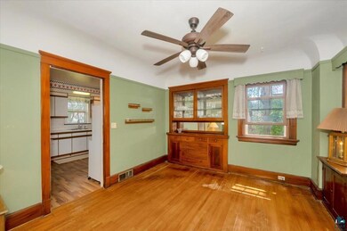 Unfurnished room with hardwood / wood-style floors