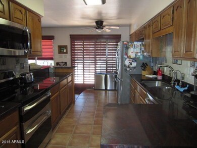 KITCHEN WITH STAINLESS/GRANITE