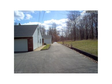 Asphalt drive with good parking and turn around
