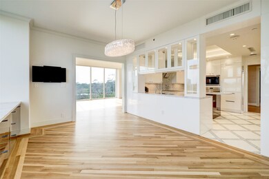 The dining room opens to the living room and kitch