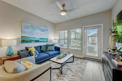Living area featuring light wood-style flooring, a