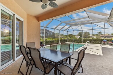 View of patio featuring an outdoor pool, a lanai,