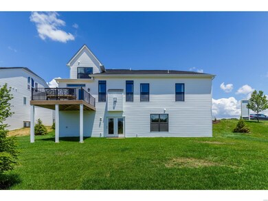 Rear Elevation with Composite Deck, Walk Out, and Irrigation System