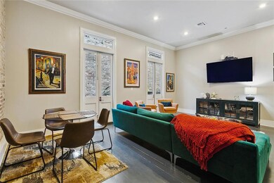 Living room with French Doors leading out to terra