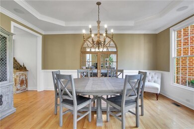 Gather together with families and friends in this bright dining room.