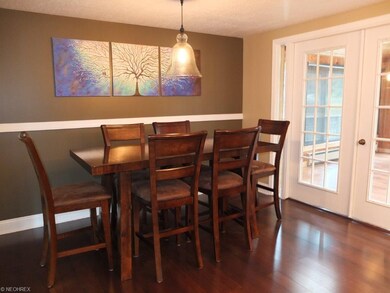 Dining room with new flooring has direct access to