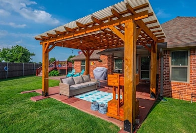 View of patio / terrace with a pergola, outdoor lounge area, area for grilling, and a deck