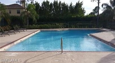 Pool with a patio area