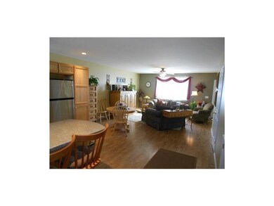 Living Room. Photo of similar unit.