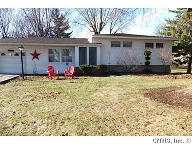 Exterior Front. House has large front lawn with ma
