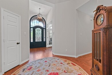 Entryway featuring a chandelier and Pergo Premium flooring